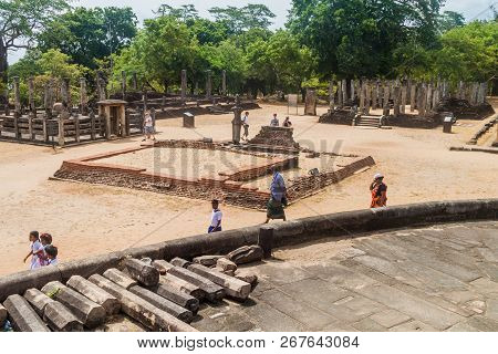 Polonnaruwa, Sri Lanka - July 22, 2016: Tourists Visit Quadrangle Temple Group In The Ancent City Po