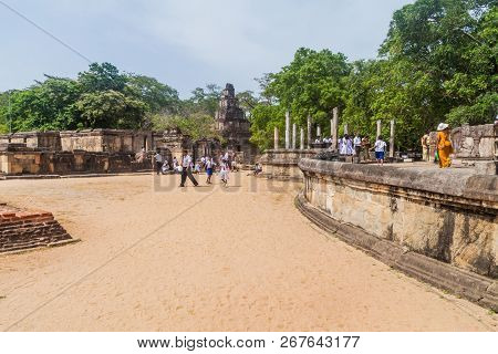 Polonnaruwa, Sri Lanka - July 22, 2016: Tourists Visit Quadrangle Temple Group In The Ancent City Po