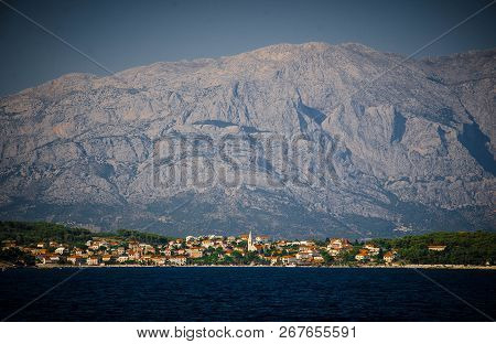 Sea View Of Small Town Sumartin Of Brac Island In Front Of Biokovo Mountain Range, Adriatic Sea, Cro