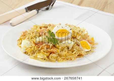 Tasty Breakfast Dish Kedgeree, Made With Hot Smoked Salmon, Egg, Rice, Curry Powder And Onion.