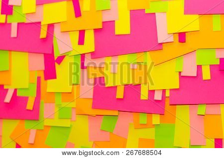 Bright Multi-colored Stickers On The Office White Board.