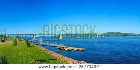 Panoramic View Of The J.c. Van Horne Bridge, Crossing The Restigouche River Between Campbellton, New