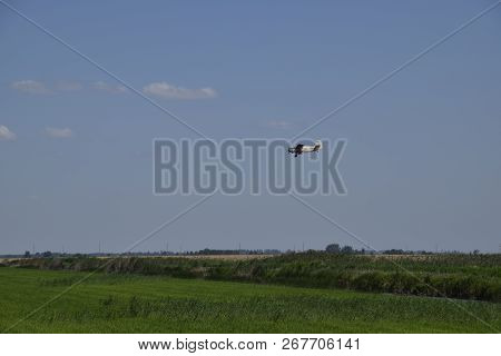 Aircraft Agricultural Aviation An-2. The Spraying Of Fertilizers And Pesticides On The Field With Th