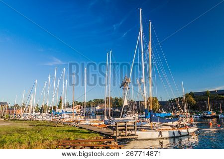Sail Boats In A Harbor At Suomenlinna Sveaborg , Sea Fortress Near Helsinki, Finland
