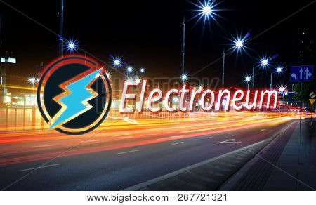 Concept Of Electroneum Coin Moving Fast On The Road, A Cryptocurrency Blockchain Platform , Digital 