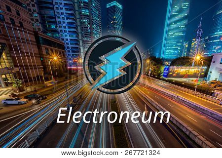Concept Of Electroneum Coin Moving Fast On The Road, A Cryptocurrency Blockchain Platform , Digital 
