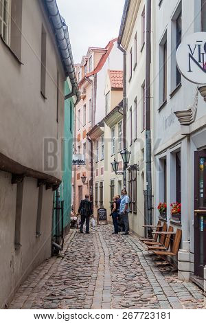 Riga, Latvia - August 19, 2016: Narrow Cobbled Alley Troksnu Iela In The Center Of Riga, Latvia