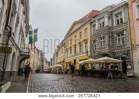 Tallinn, Estonia - August 22, 2016: People Walk Along Cobbled Pikk Street In The Old Town Of Tallinn