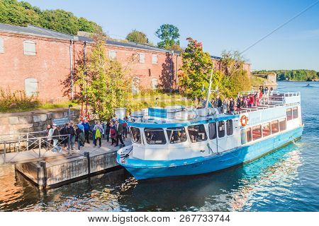 Helsinki, Finland - August 24, 2016: Ferry Arrived In Suomenlinna Sveaborg - Inhabited Sea Fortress 