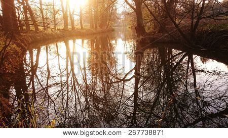 Evening atmosphere on the Radbuza river. Western Bohemia, Czech Republic. Sunset landscape wallpaper with 16 : 9 ratio.