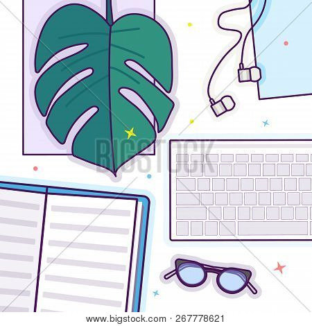 Flat Lay With Glasses, Open Book, Glasses, Headphones, Keyboard And Monstera Leaf