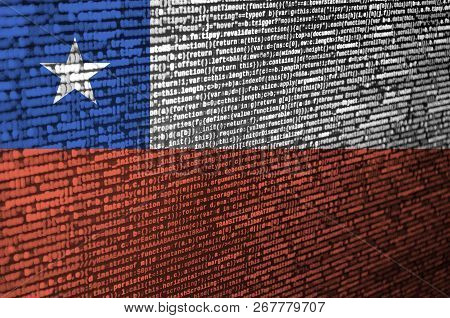 Chile Flag  Is Depicted On The Screen With The Program Code. The Concept Of Modern Technology And Si