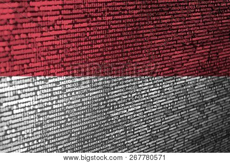 Indonesia Flag  Is Depicted On The Screen With The Program Code. The Concept Of Modern Technology An