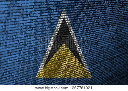 Saint Lucia Flag  Is Depicted On The Screen With The Program Code. The Concept Of Modern Technology 