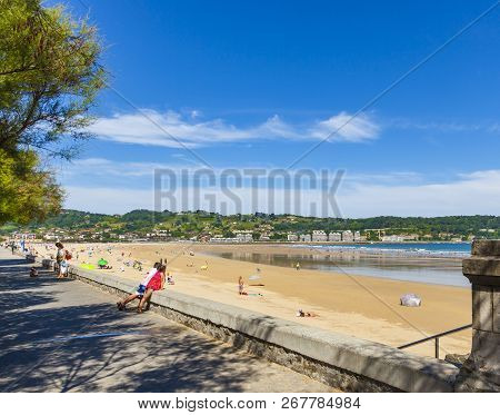 Hendaye, France - June 8: Tourists And Surfers Enjoy The Beach Of The Charming Seaside Resort Of Hen