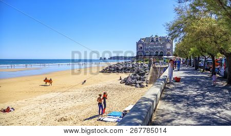 Hendaye, France - June 8: Tourists And Surfers Enjoy The Beach Of The Charming Seaside Resort Of Hen