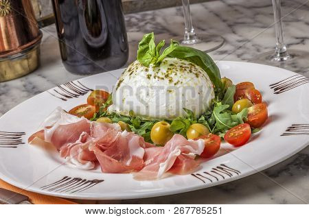 Nothing Compares To The Taste Of A Fresh Buffalo Mozzarella With Basil, Rucula And Freshly Sliced Pa