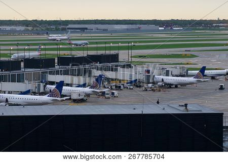 Chicago, Illinois, United States - May 11th, 2018: Several Airplanes At The Gate At Chicago Ohare In