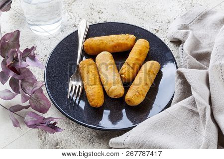 Latin-american Appetizers Called Tequenos Made Of Fried Corn Filled With Cheese.