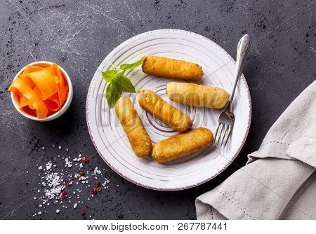 Latin-american Appetizers Called Tequenos Made Of Fried Corn Filled With Cheese.