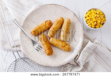 Latin-american Appetizers Called Tequenos Made Of Fried Corn Filled With Cheese.