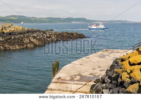 Launch Ship Appoaching Inchcolm Island With Medieval Abbey Near Edinburgh