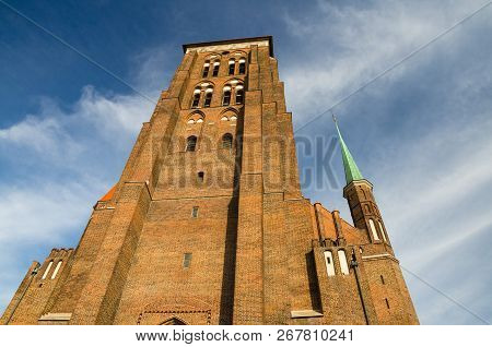 Brick Building Tower With Spires Of Basilica Assumption Blessed Virgin Mary St Marys Church Cathedra