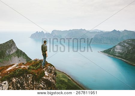 Active Man Traveling Walking Alone On Cliff Mountain Edge Above Sea Adventure Healthy Lifestyle Summ