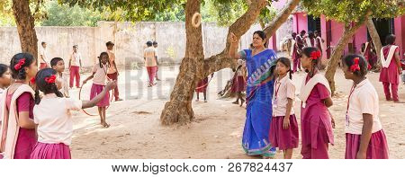 Puduchery, India - March Circa, 2018 : Unidentified Teacher Playing Game With Boys And Girls Smiling