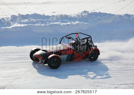 MOSCOW - MAR 2, 2018: First Russian serial racing car Shortcut at snowy track, developed by 527 design office of DK Racing Company