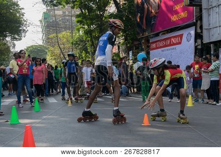 Kolkata, West Bengal, India - March 15th 2015 : Children Rollerskating On Park Street For 