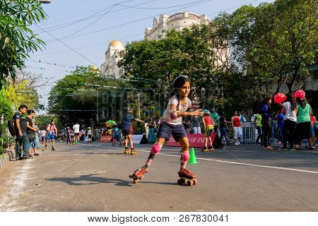 Kolkata, West Bengal, India - March 15th 2015 : Children Rollerskating On Park Street For 