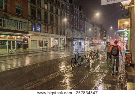 Copenhagen, Denmark - August 28, 2016: Night Rainy View Of Vesterbrogade Street In Copenhagen, Denma