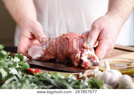 Close-up Cutting Fresh Meat For Cooking Meat Dishes