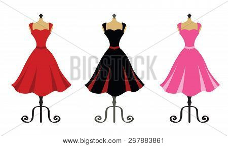 Beautiful Elegant Red, Black And Pink Dresses On Mannequin Stands
