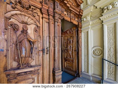 Lucerne, Switzerland - April 2017: Wooden Entrance Door To St Leodegar Church Interior