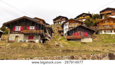 Bettmeralp, Switzerland - May 2017: Traditional Houses In Car Free Village In Swiss Alps