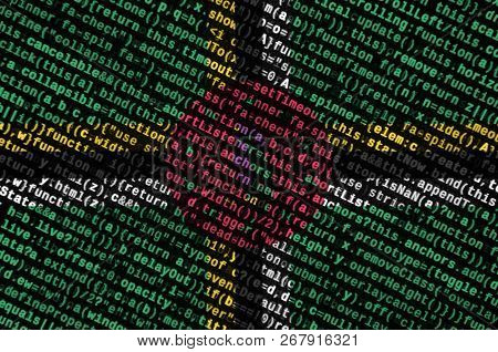 Dominica Flag  Is Depicted On The Screen With The Program Code. The Concept Of Modern Technology And