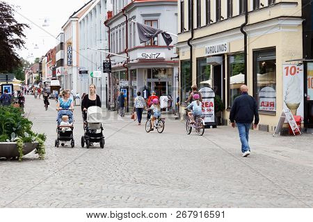 Vaxjo, Sweden - June 26, 2018: People Valking The Storgatan Pedestrian Street In Downtown Vaxjo.