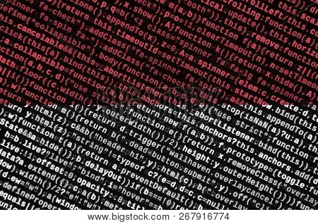 Indonesia Flag  Is Depicted On The Screen With The Program Code. The Concept Of Modern Technology An