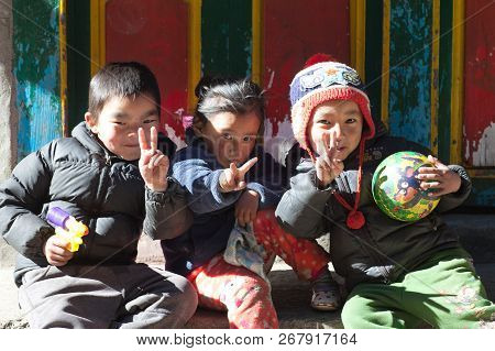 Namche Bazaar, Nepal - January 19, 2017: Nepalese Children Poses For A Photo On The Street