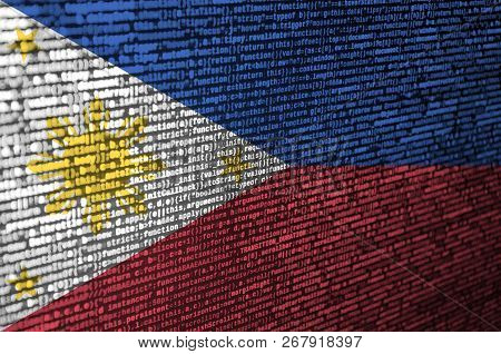 Philippines Flag  Is Depicted On The Screen With The Program Code. The Concept Of Modern Technology 