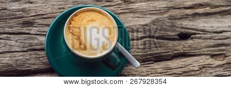 A Cup Of Coffee On The Background Of An Old Wooden Table A Heart For Coffee. St. Valentines Day Conc