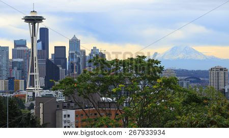 The Seattle, Washington Skyline With Mount Ranier On Cloudy Day