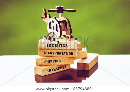 Logistics Transportation Concept : Plane Model With Wooden Blocks For Letter E.g Shipping, Industry,