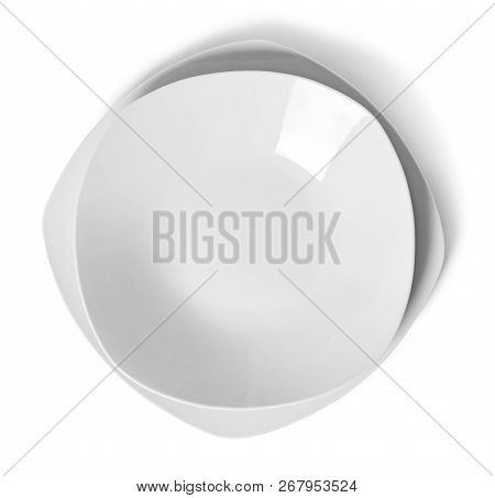 White Plate Or Dish Ware, Modern Porcelain Plate. Isolated Object On White Background. Elegant Plate