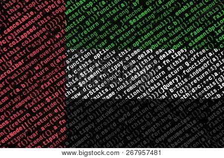 United Arab Emirates Flag  Is Depicted On The Screen With The Program Code. The Concept Of Modern Te