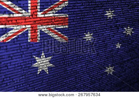 Australia Flag  Is Depicted On The Screen With The Program Code. The Concept Of Modern Technology An