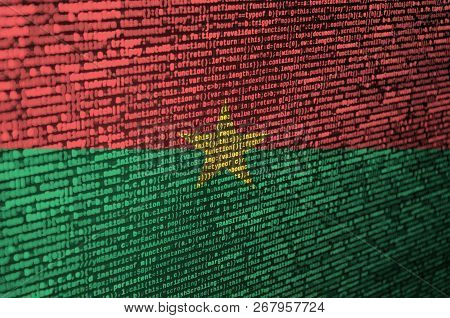 Burkina Faso Flag  Is Depicted On The Screen With The Program Code. The Concept Of Modern Technology