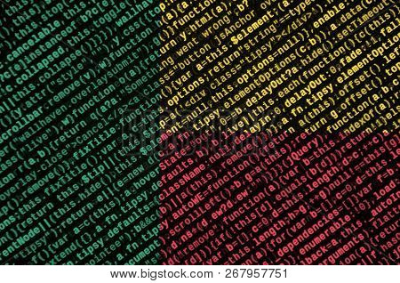Benin Flag  Is Depicted On The Screen With The Program Code. The Concept Of Modern Technology And Si
